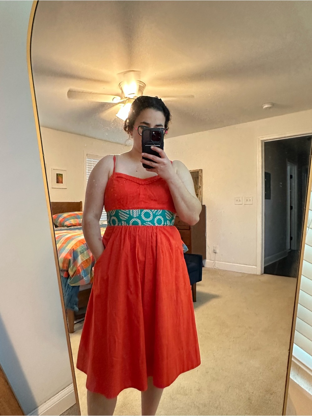 Orange sundress with green ribbon from Anthropologie
